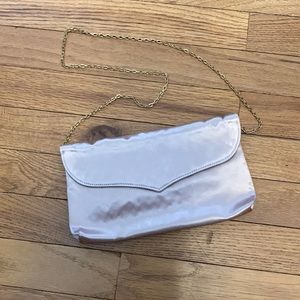 Pink crossbody clutch